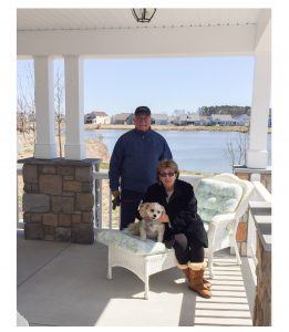 Three very happy Millville By The Sea homeowners (and dog!)