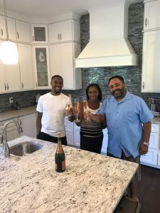 A very happy family in their new Christopher Companies built home